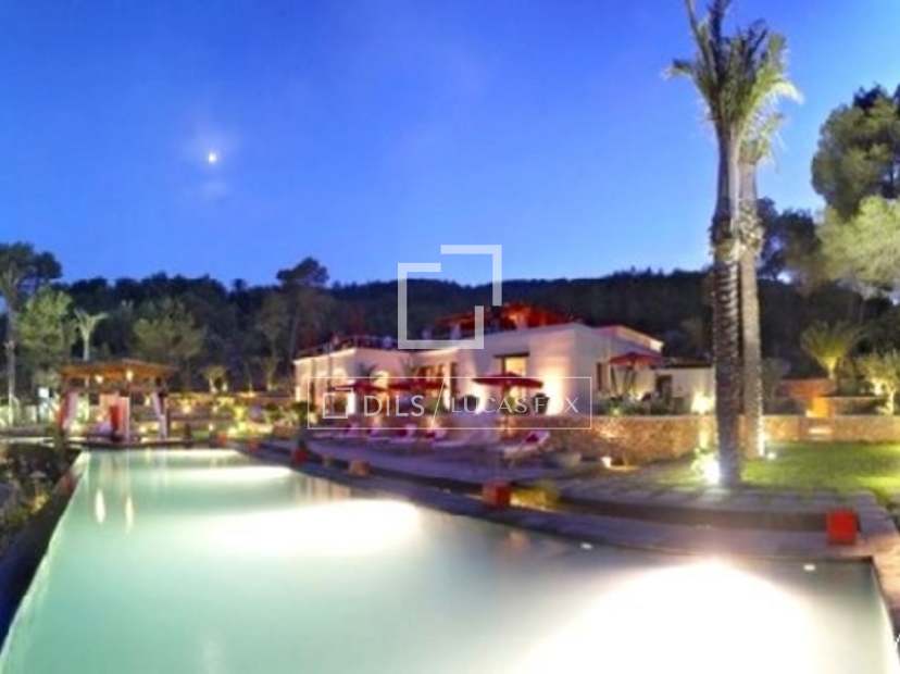 Incredible designer house for sale in San Carlos Ibiza with stunning views of the Morna valley. Luxury Ibiza property to buy with excellent interior design